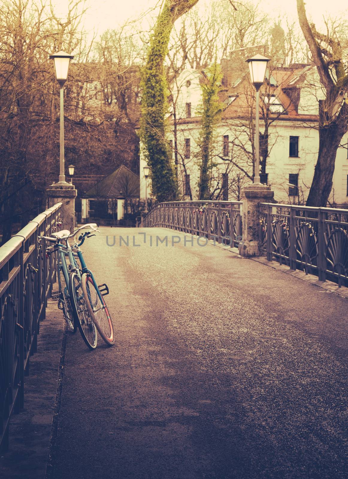 Retro filtered bicycles on a bridge in winter in a European city