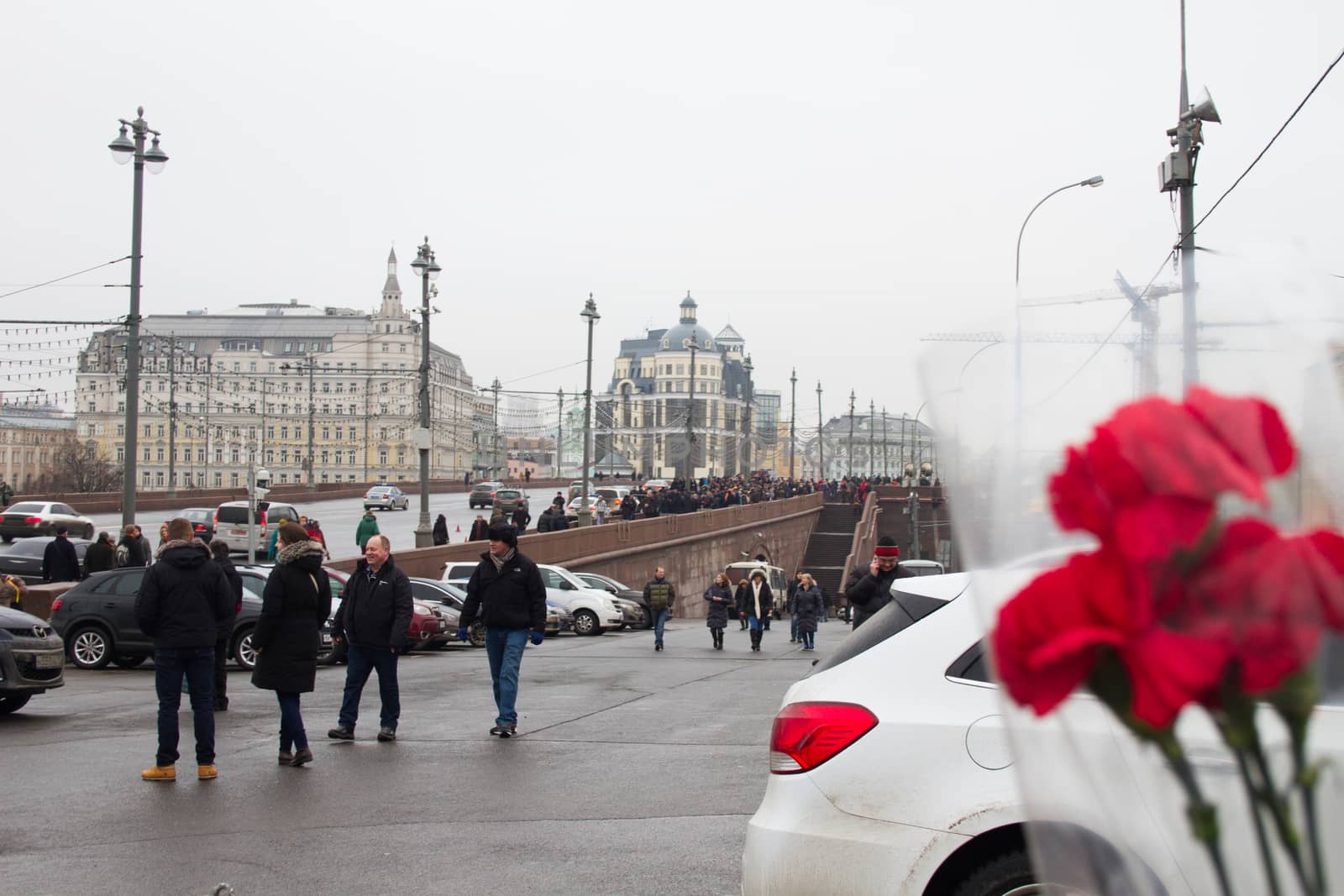 People bring flowers to the site of the murder of politician Boris Nemtsov by olegkozyrev