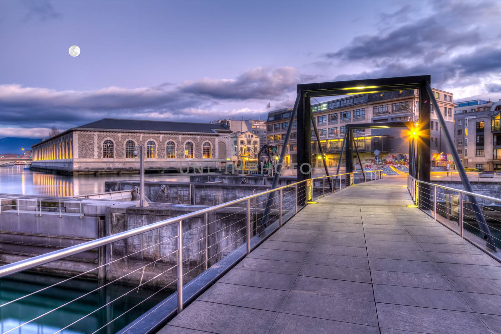 Footbridge on Seujet dam by sunset, Geneva, Switzerland, HDR