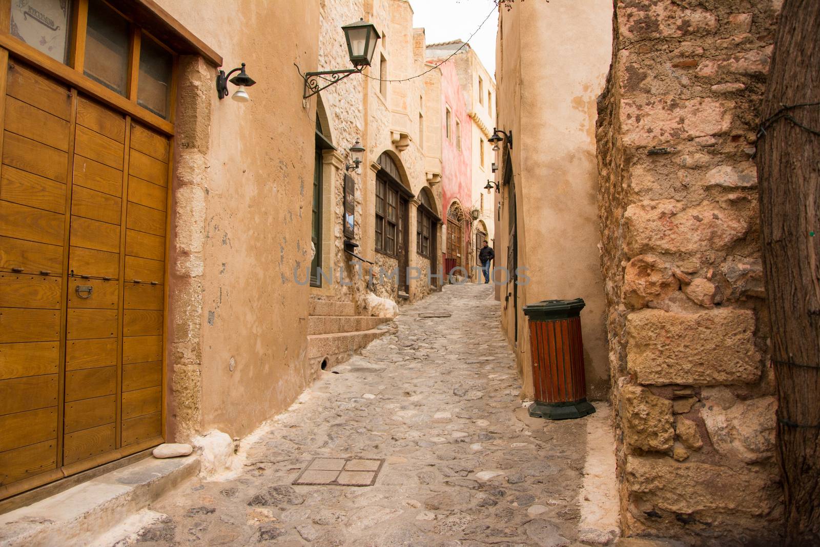 Taking a nice walk inside Monemvasia narrow stone built alleys.