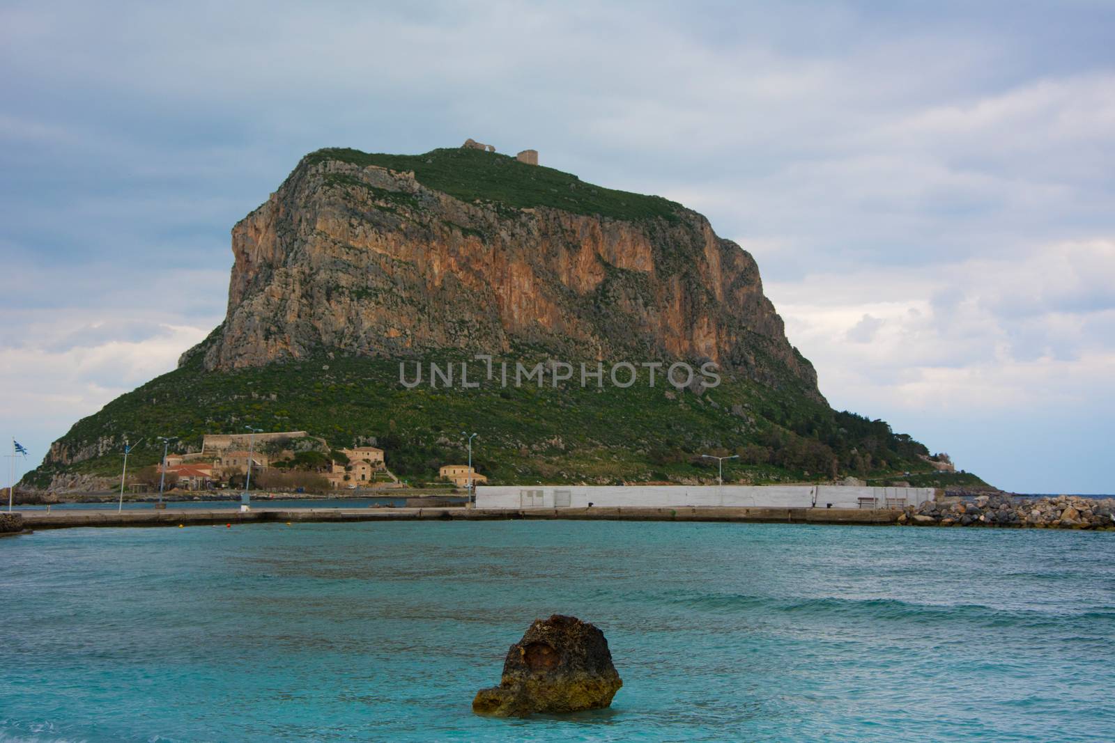 Distant view of the Monemvasia hill, with the castle remnants.