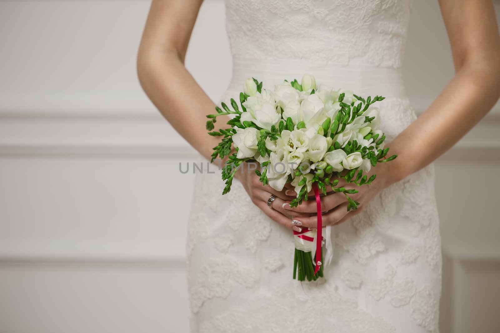Beautiful wedding bouquet in hands by sarymsakov