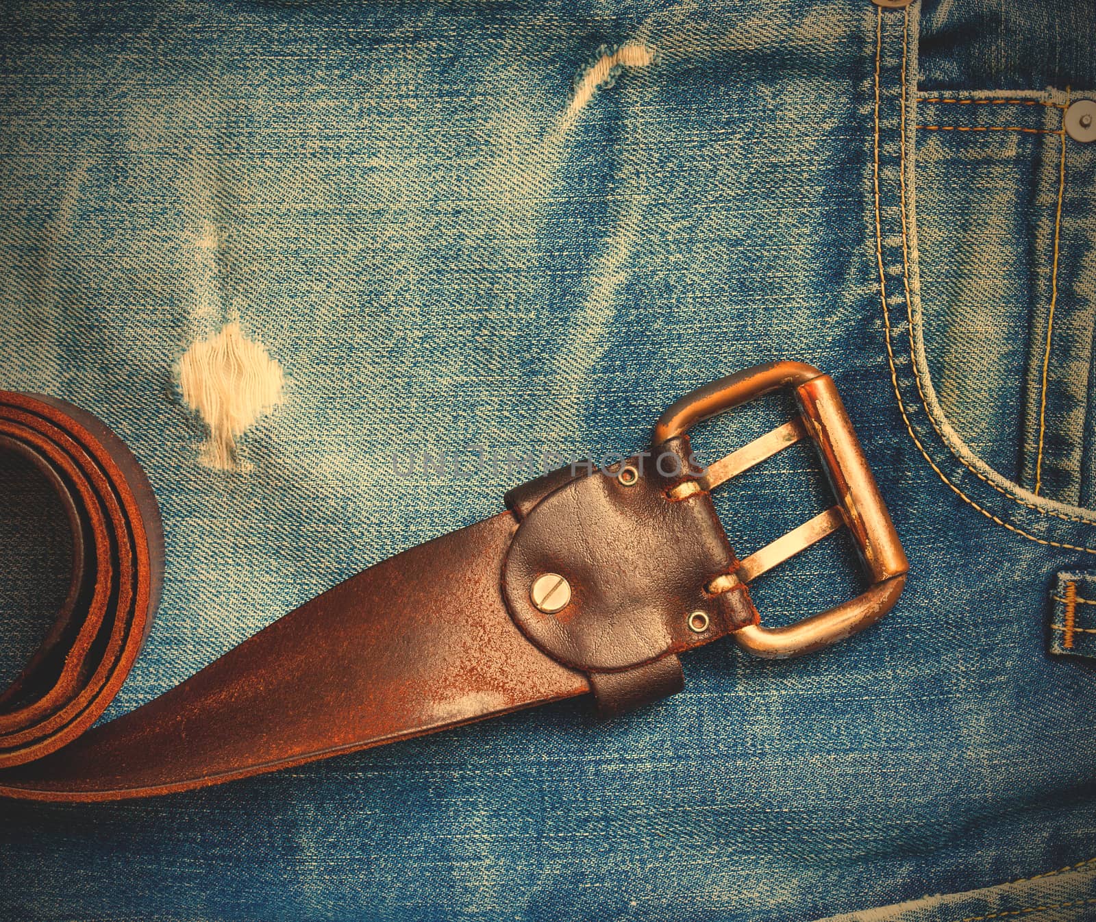 vintage leather belt on old jeans by Astroid