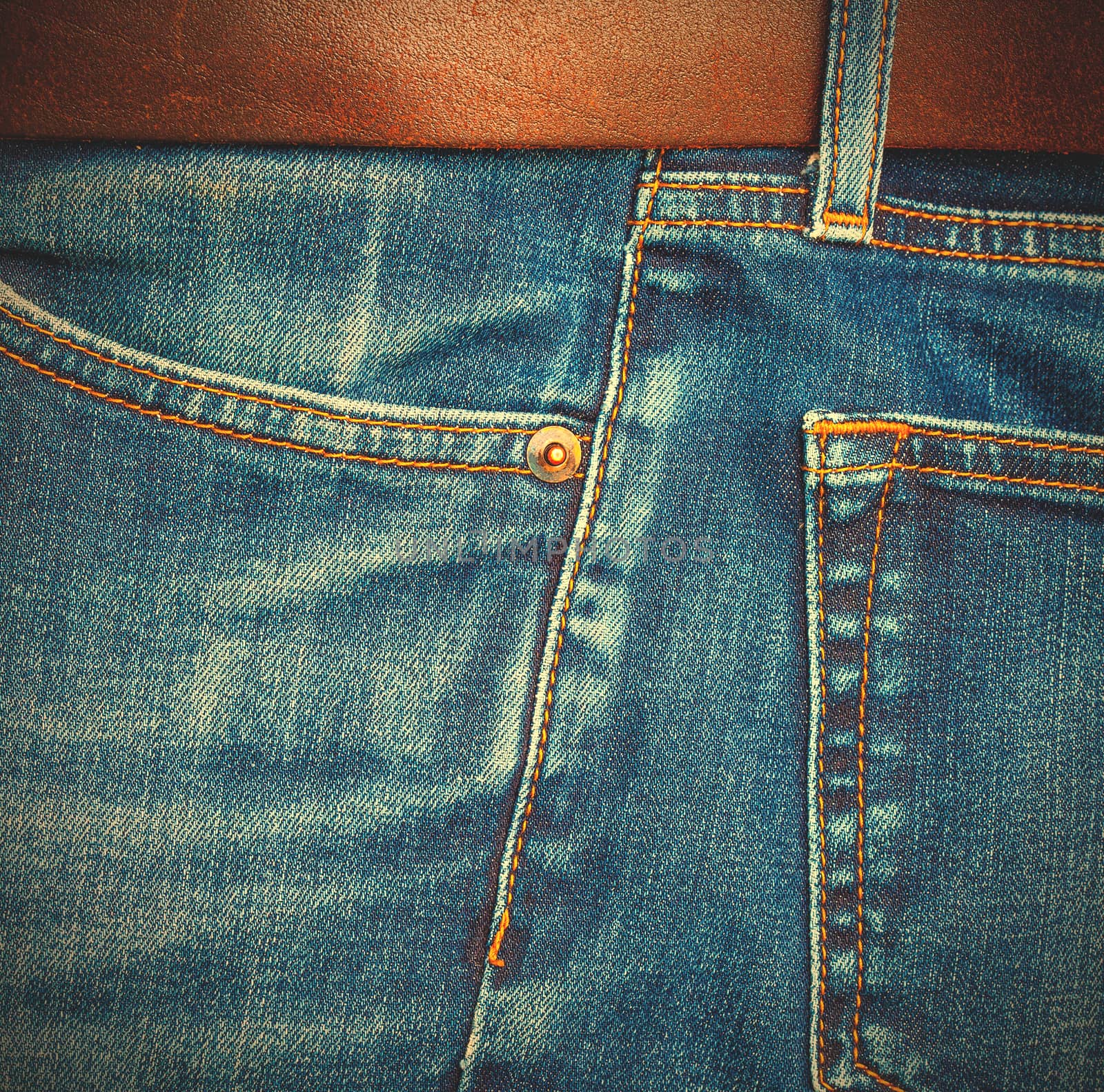 jeans with a brown leather belt, side view. instagram image style