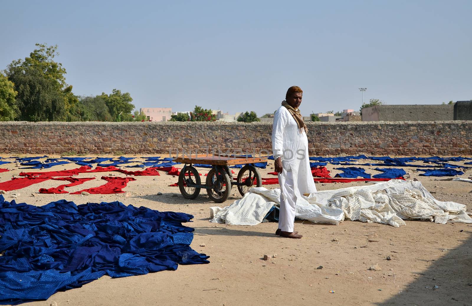 Jodhpur, India - January 2, 2015: Textile worker in a small factory on January 2, 2015 in Jodhpur, India. The textile industry continues to be the second largest employment generating sector in India.