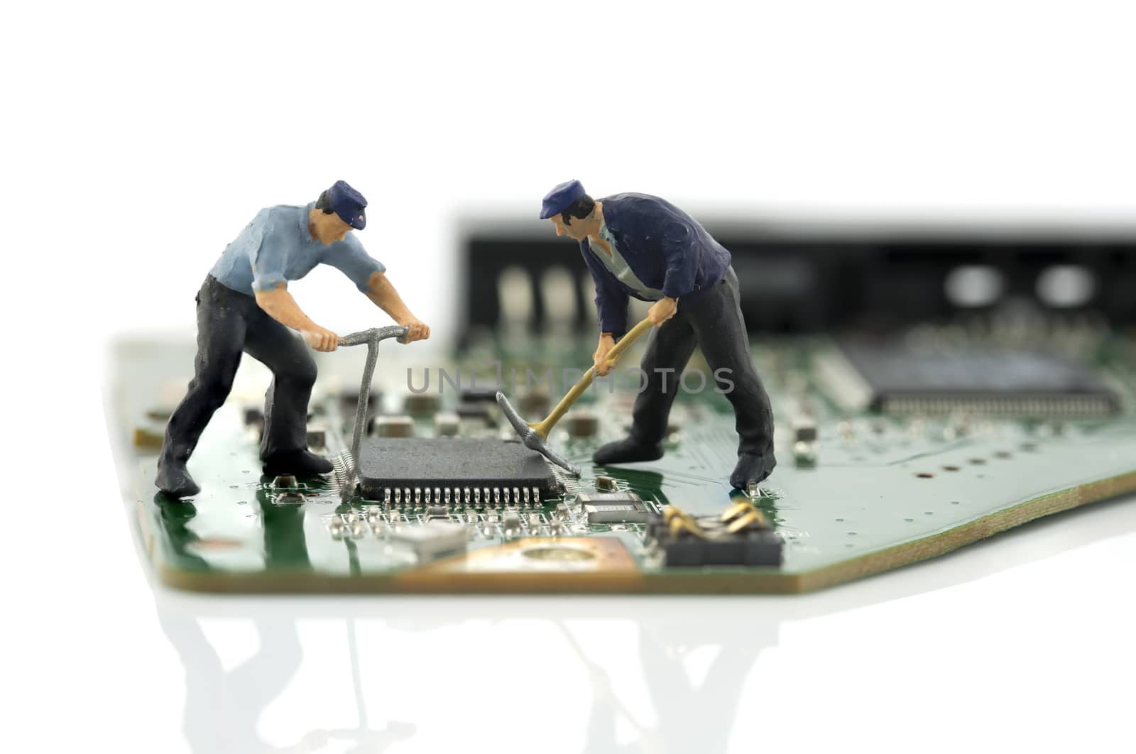 two man repair chips by compuinfoto