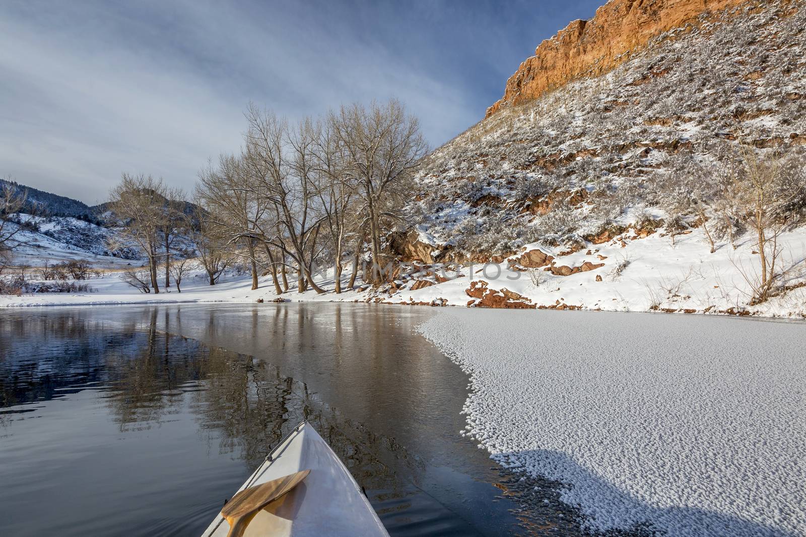 winter canoe paddling on Horsetooth Reservoir near Fort Collins in northern Colorado
