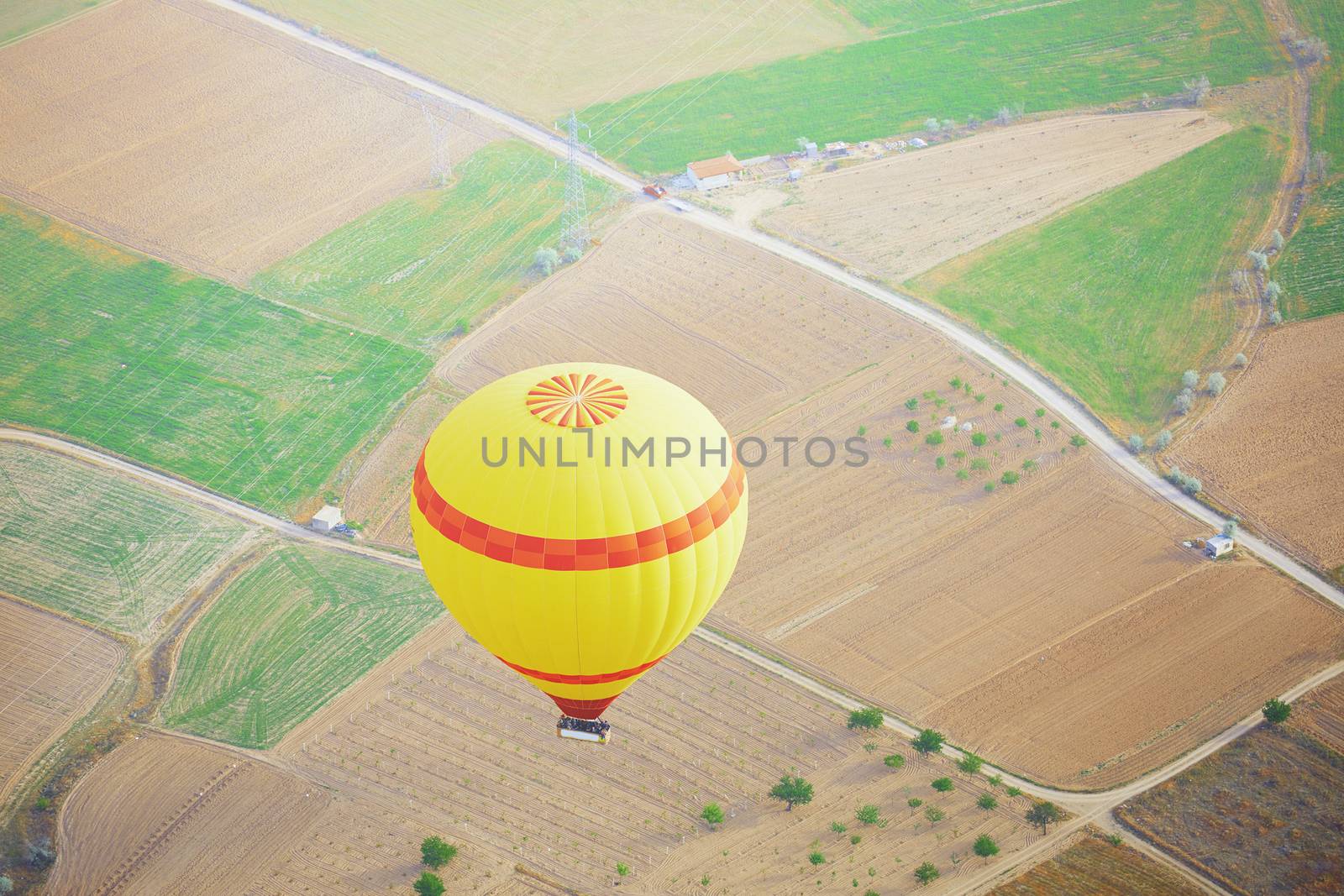 Air balloon flying above the land. Horizontal photo