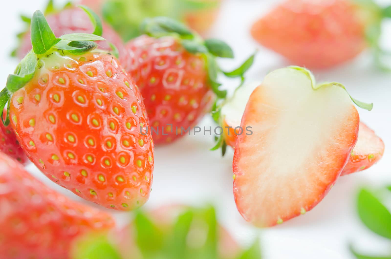 close up of fresh strawberries , red fruits