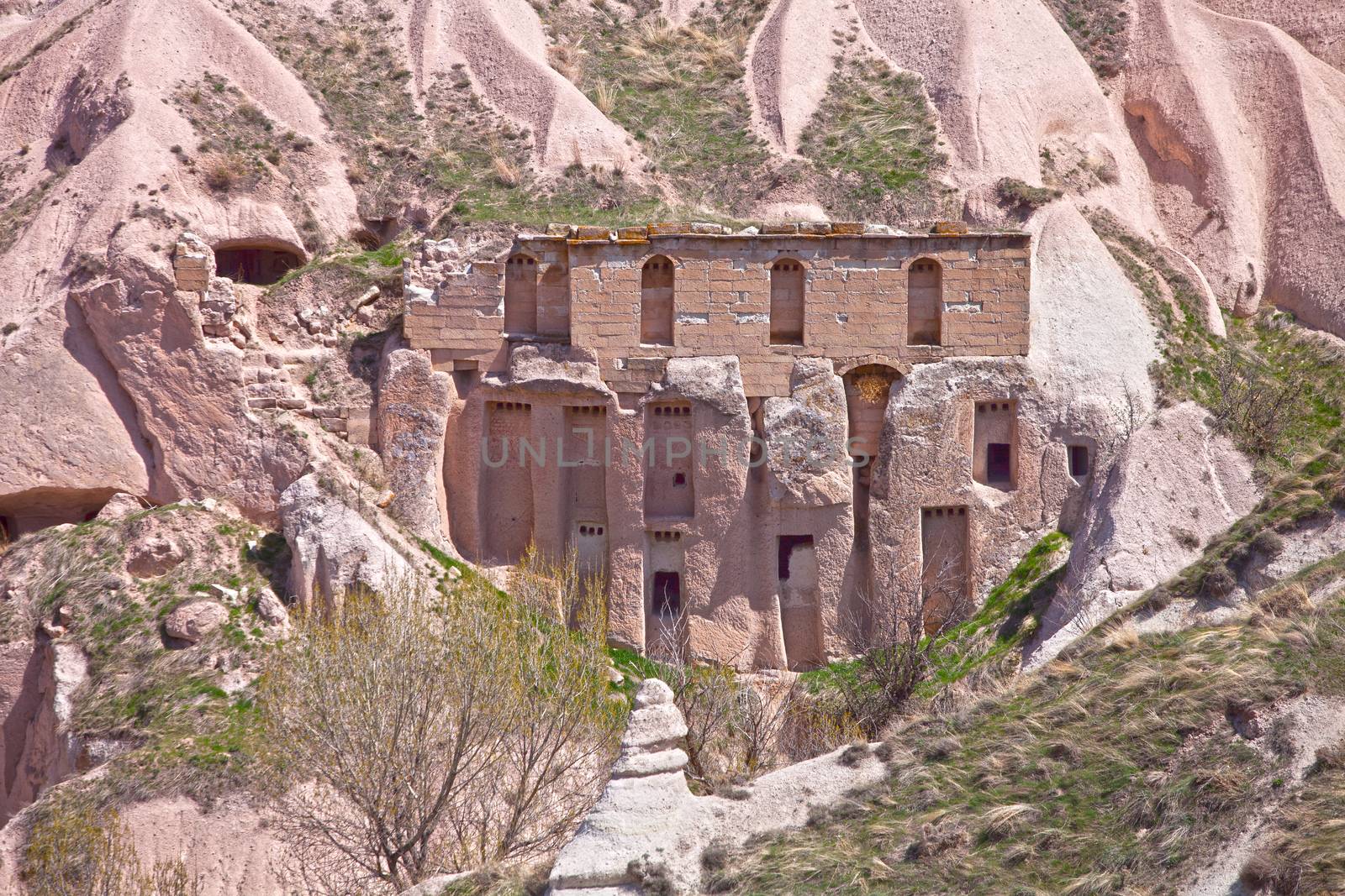 Home built into the soft rock cliffs of Cappadocia Turkey