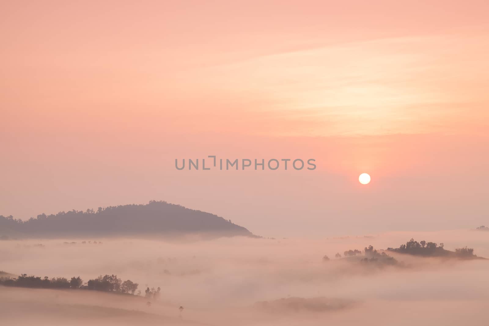 Fog covered mountains And the Rising Sun by a454