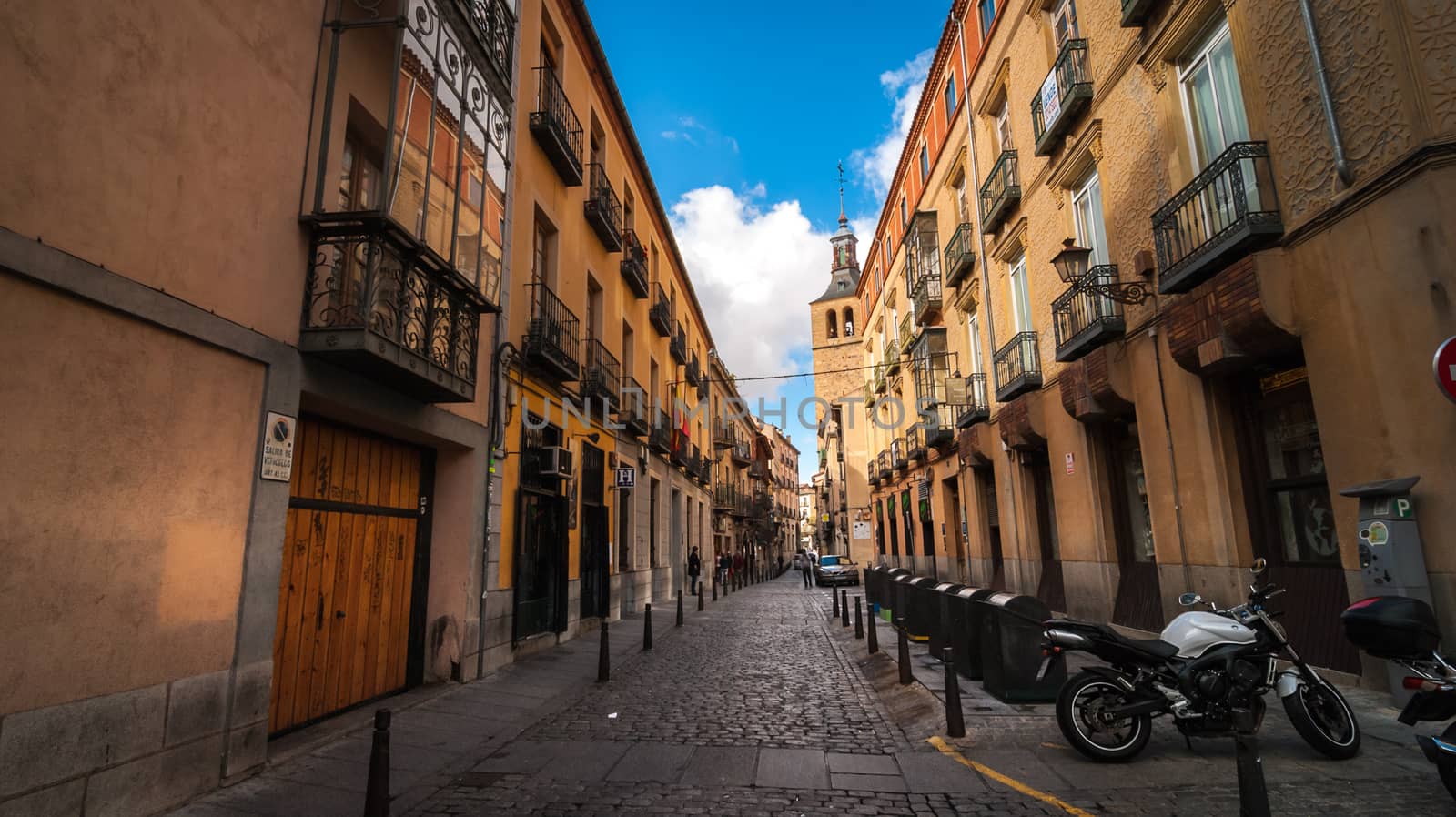 A walk along the sheltered and shaded alleyways of Segovia, Spain.