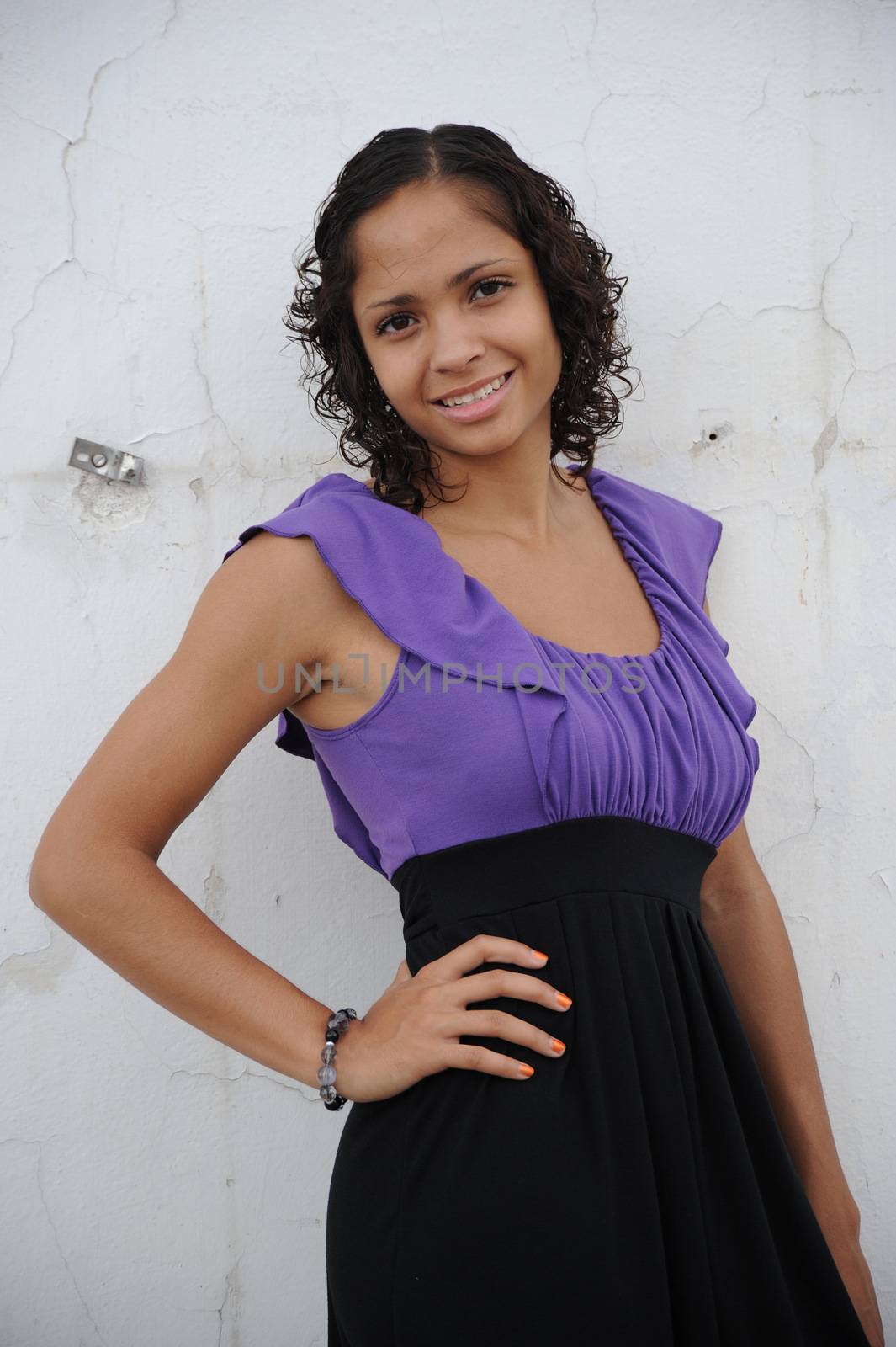 African american female beauty posing outside.