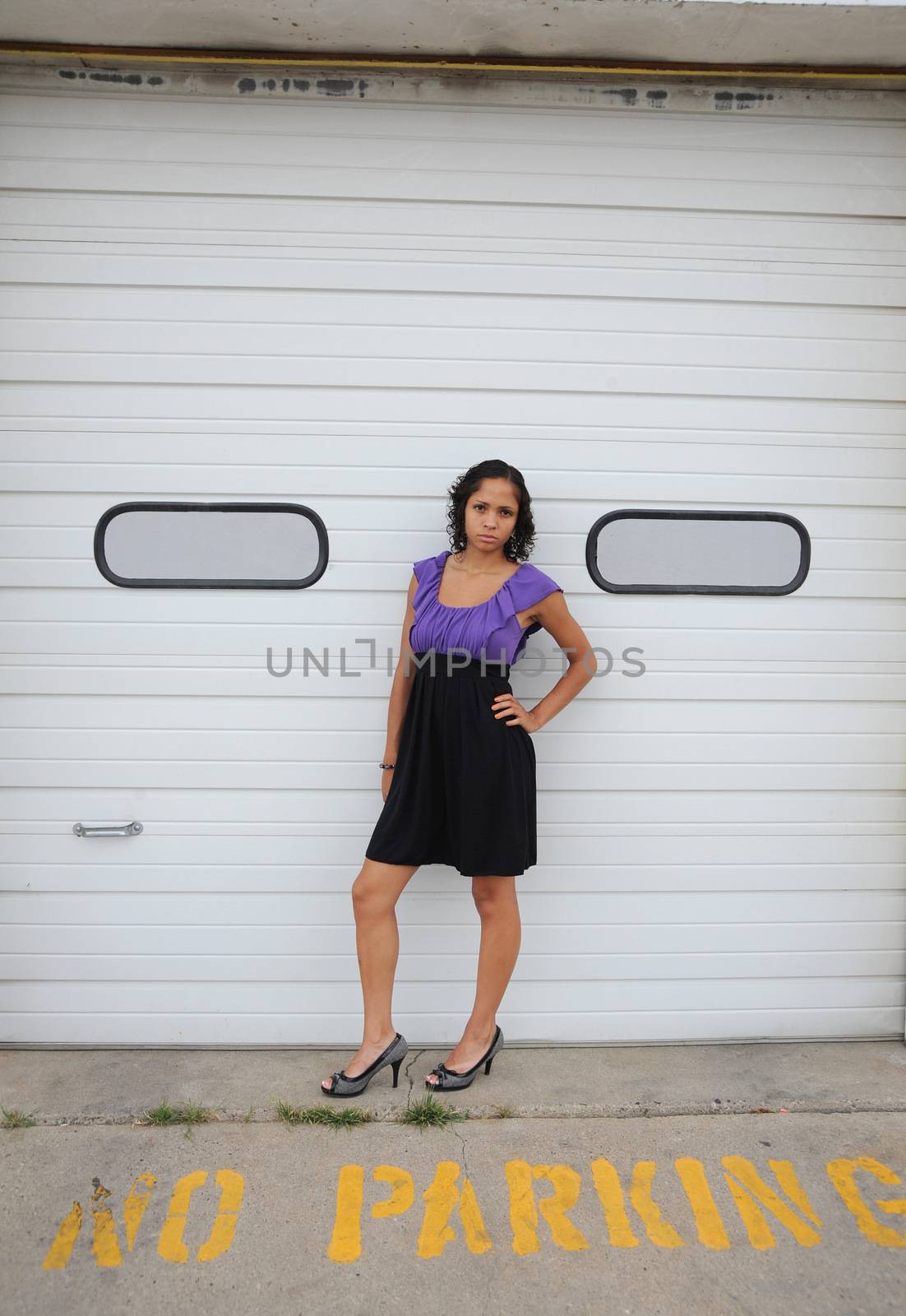 African american female beauty posing outside.