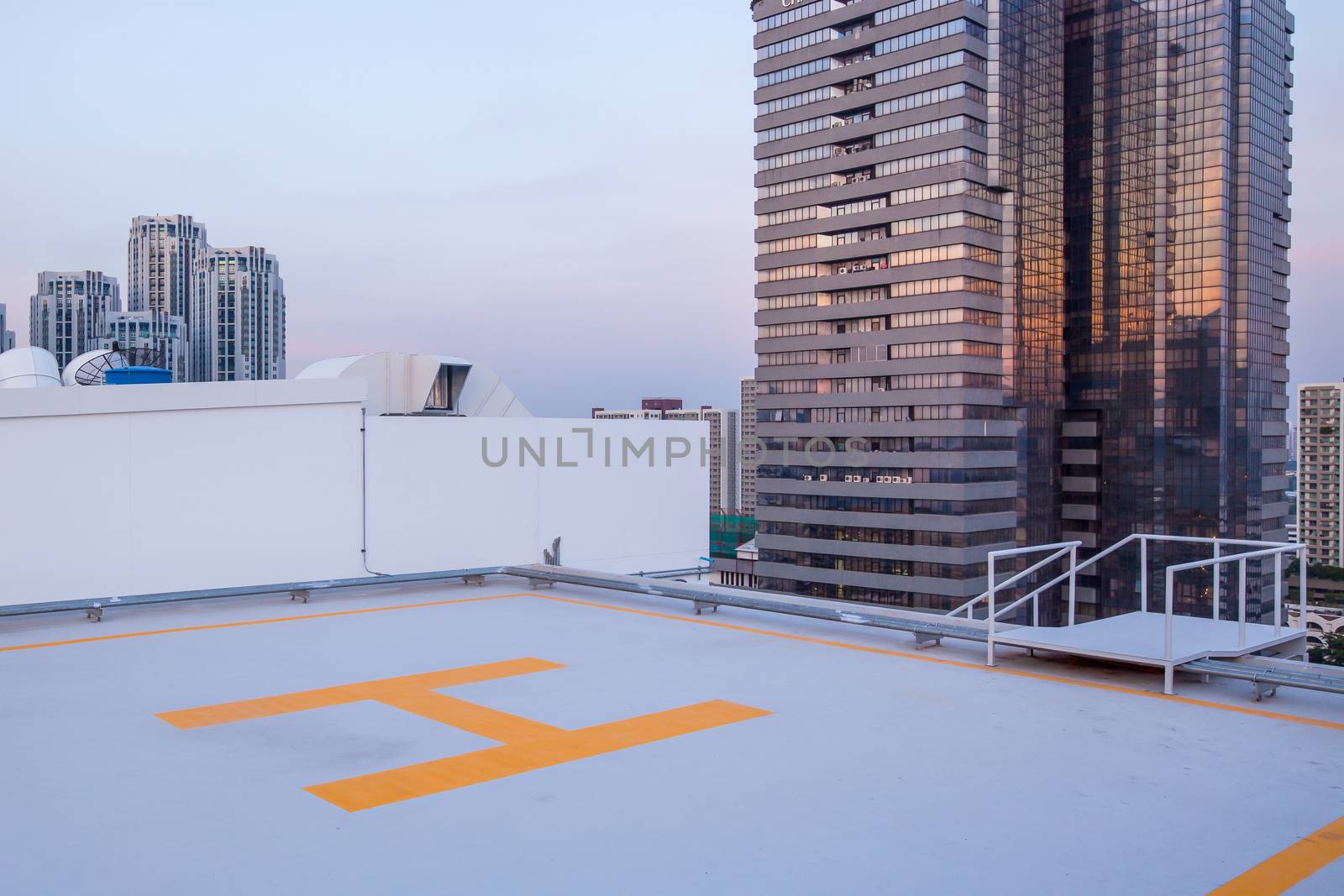 helipad for helicopter on roof top building for people transportation