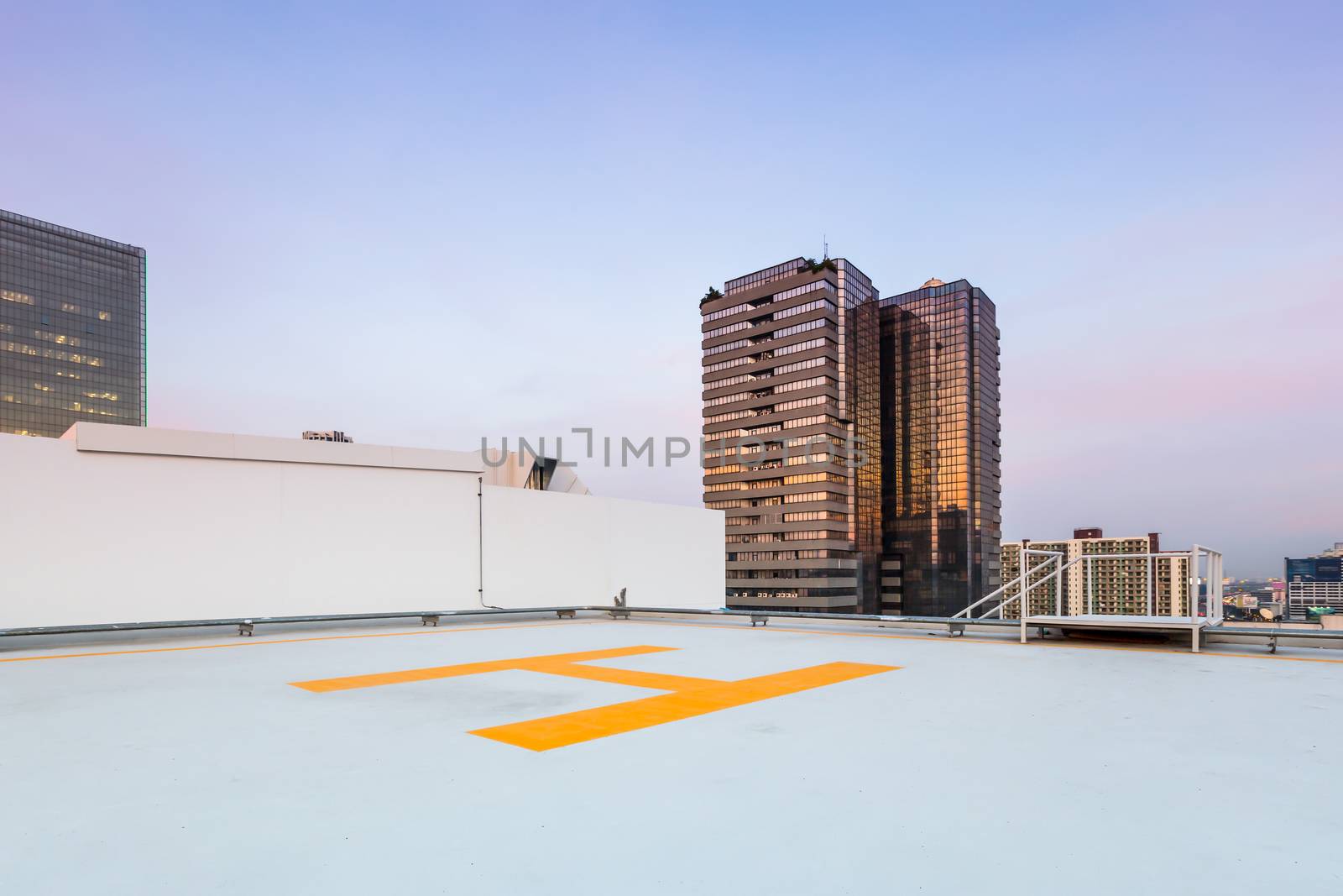 helipad for helicopter on roof top building for people transportation