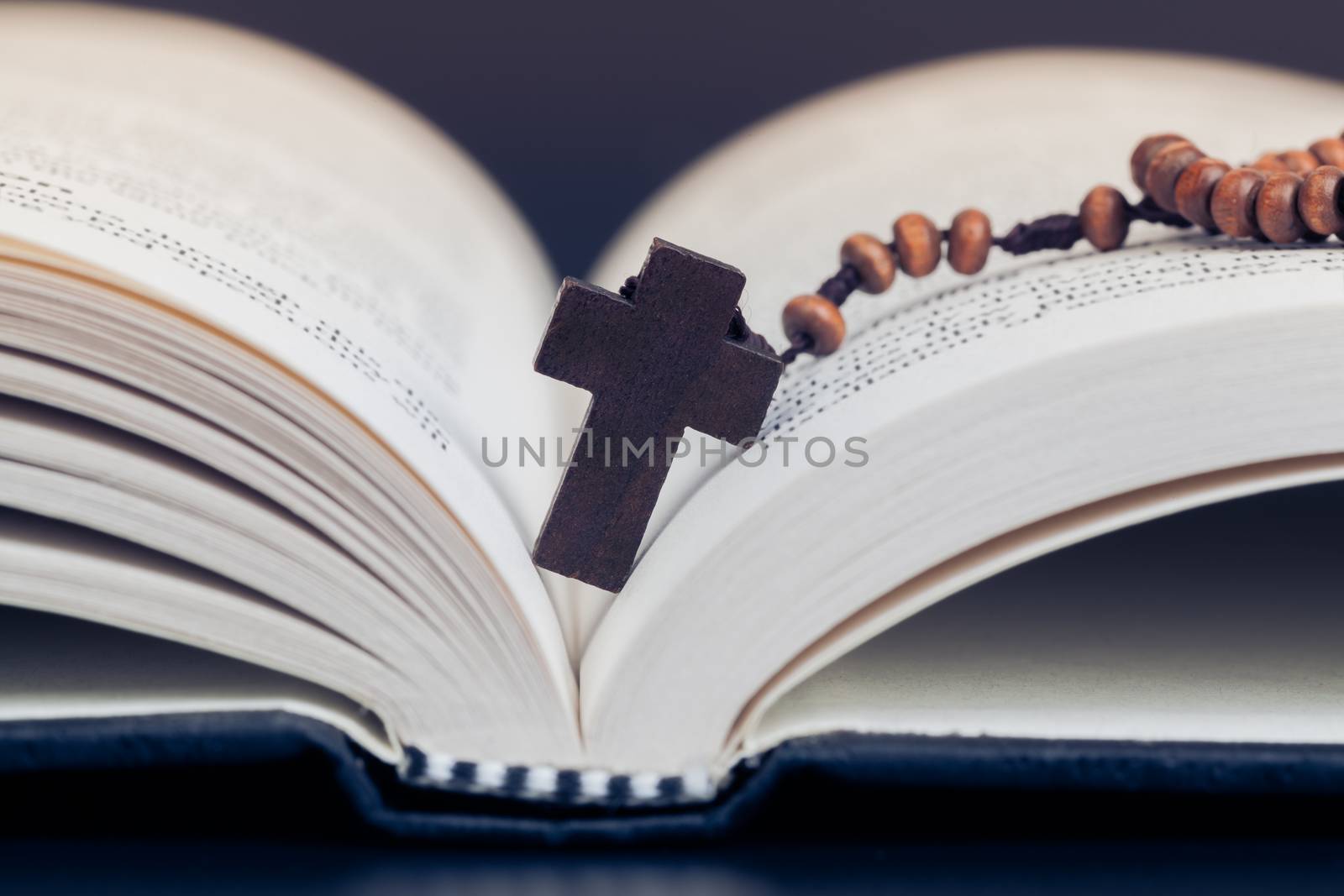 Christian cross necklace on Holy Bible book, Jesus religion conc by FrameAngel