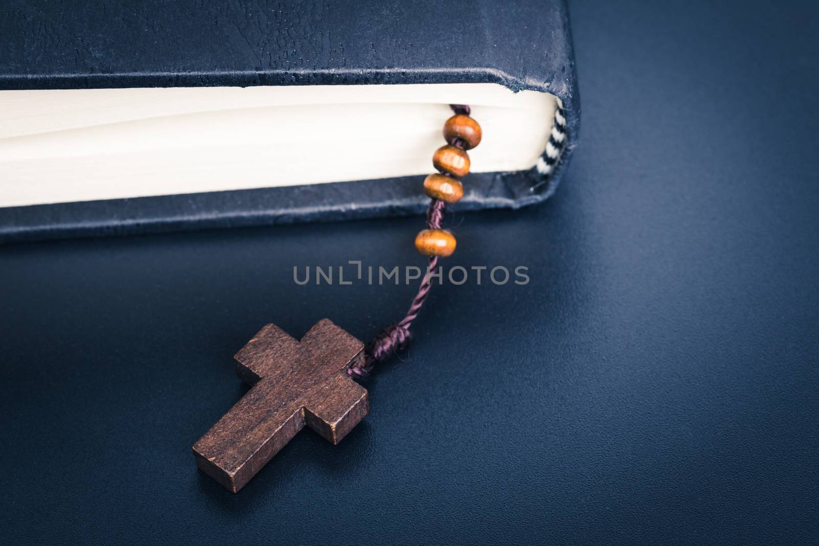 Christian cross necklace on Holy Bible book, Jesus religion conc by FrameAngel