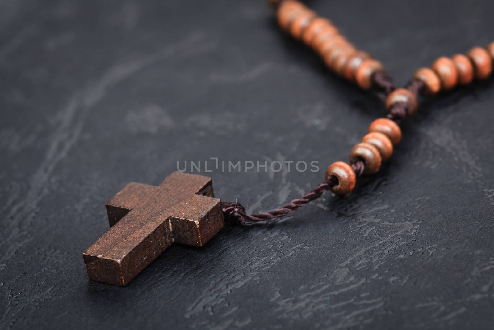 Christian cross necklace on Holy Bible book, Jesus religion concept as good friday or easter festival