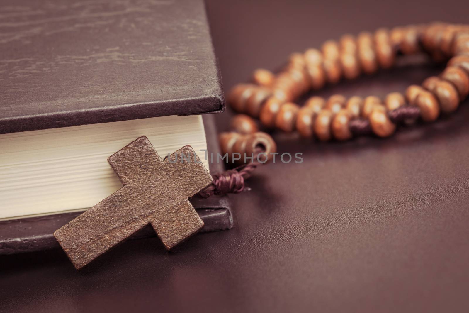 Christian cross necklace on Holy Bible book, Jesus religion conc by FrameAngel