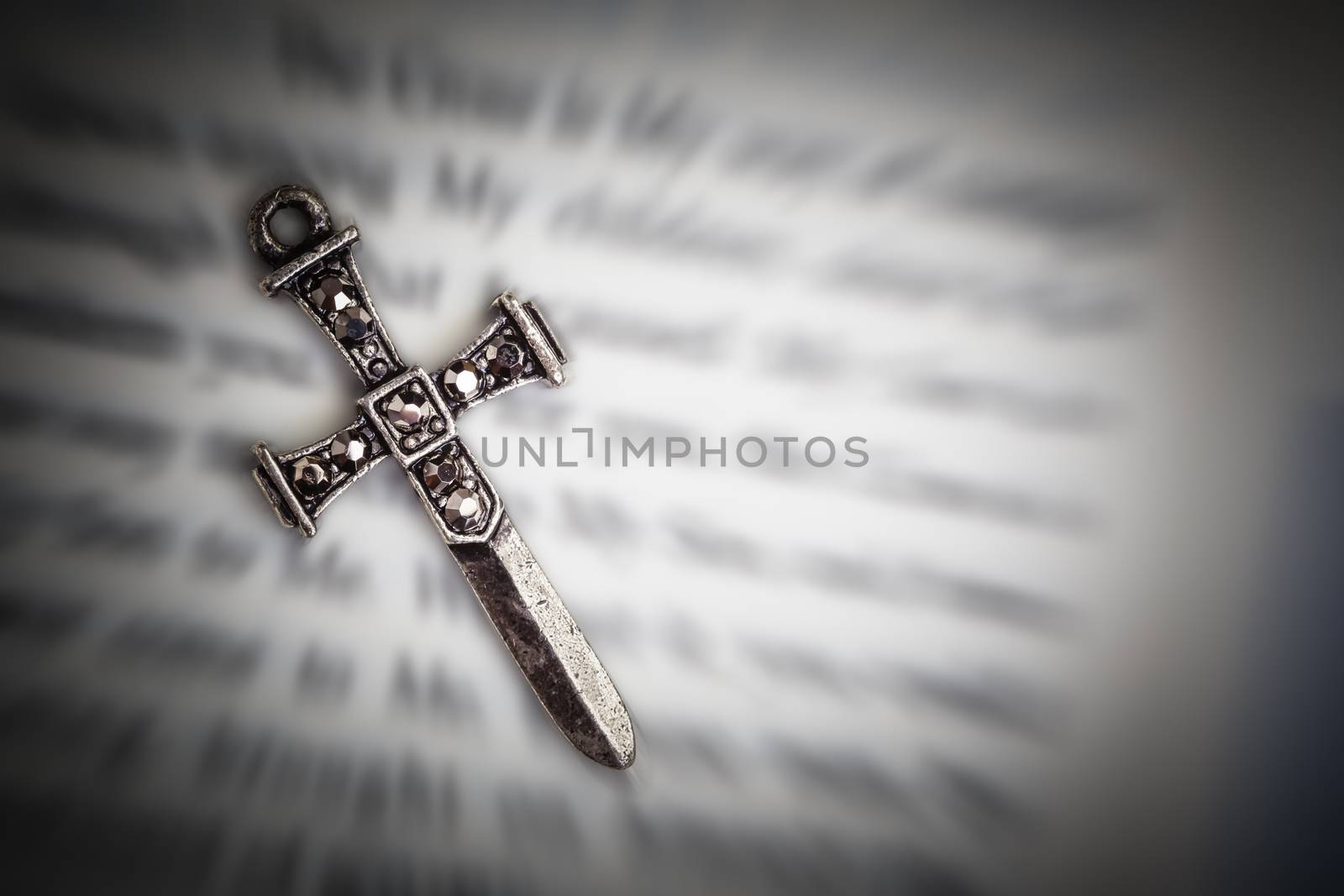 Christian cross necklace on Holy Bible book, Jesus religion concept as good friday or easter festival