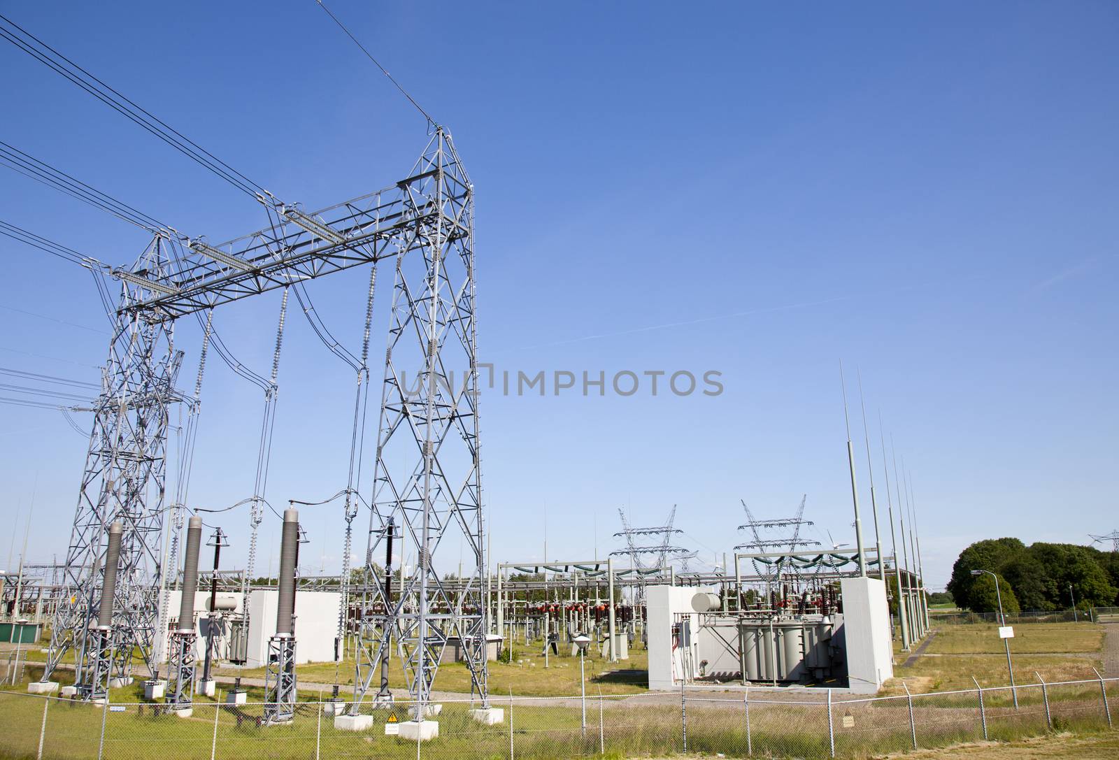 View at electricity installation with blue sky