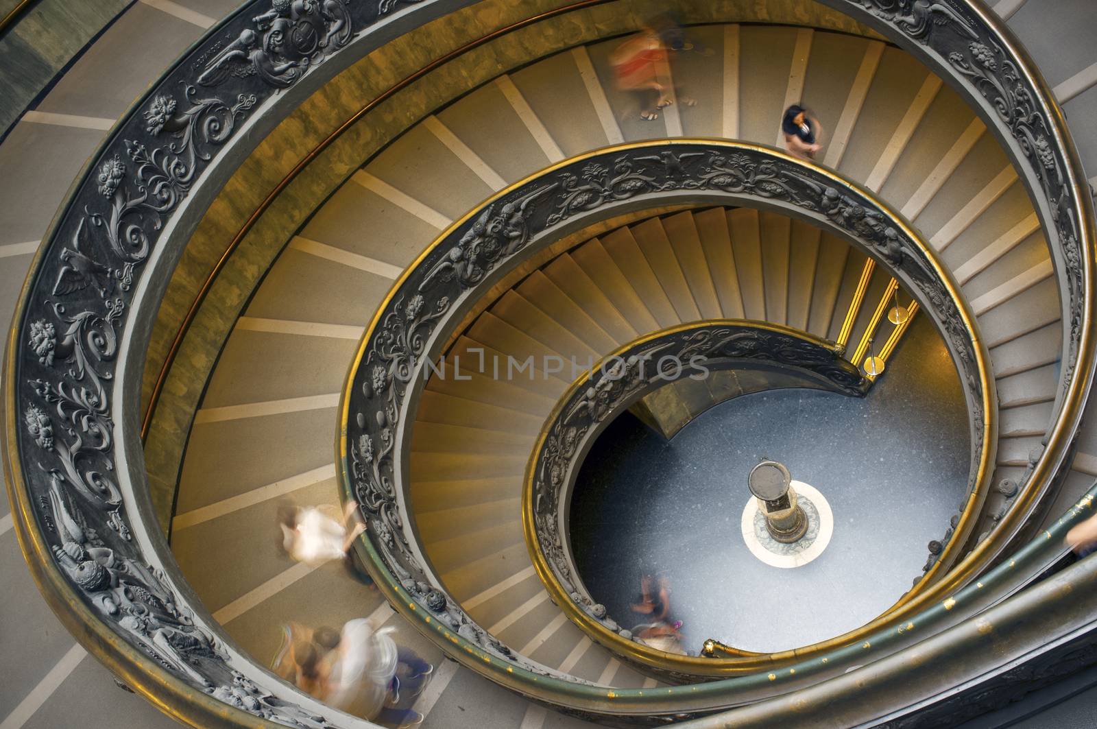 VATICAN CITY, VATICAN STATE - SEPTEMBER 22, 2014: The double helix staircase designed by Giuseppe Momo in 1932, inspired by the revolutionary spiral staircase designed by Donato Bramante