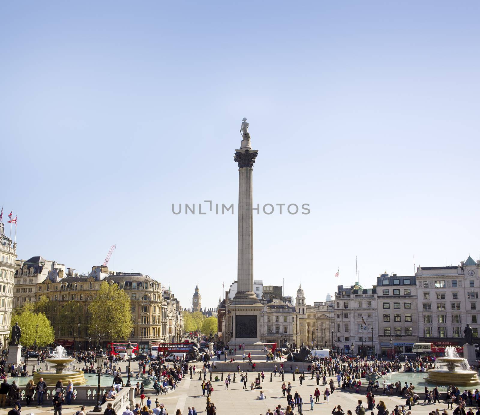 LONDON, UK - APRIL 16, 2014: Trafalgar Square is a public space and tourist attraction in central London, built around the area formerly known as Charing Cross.