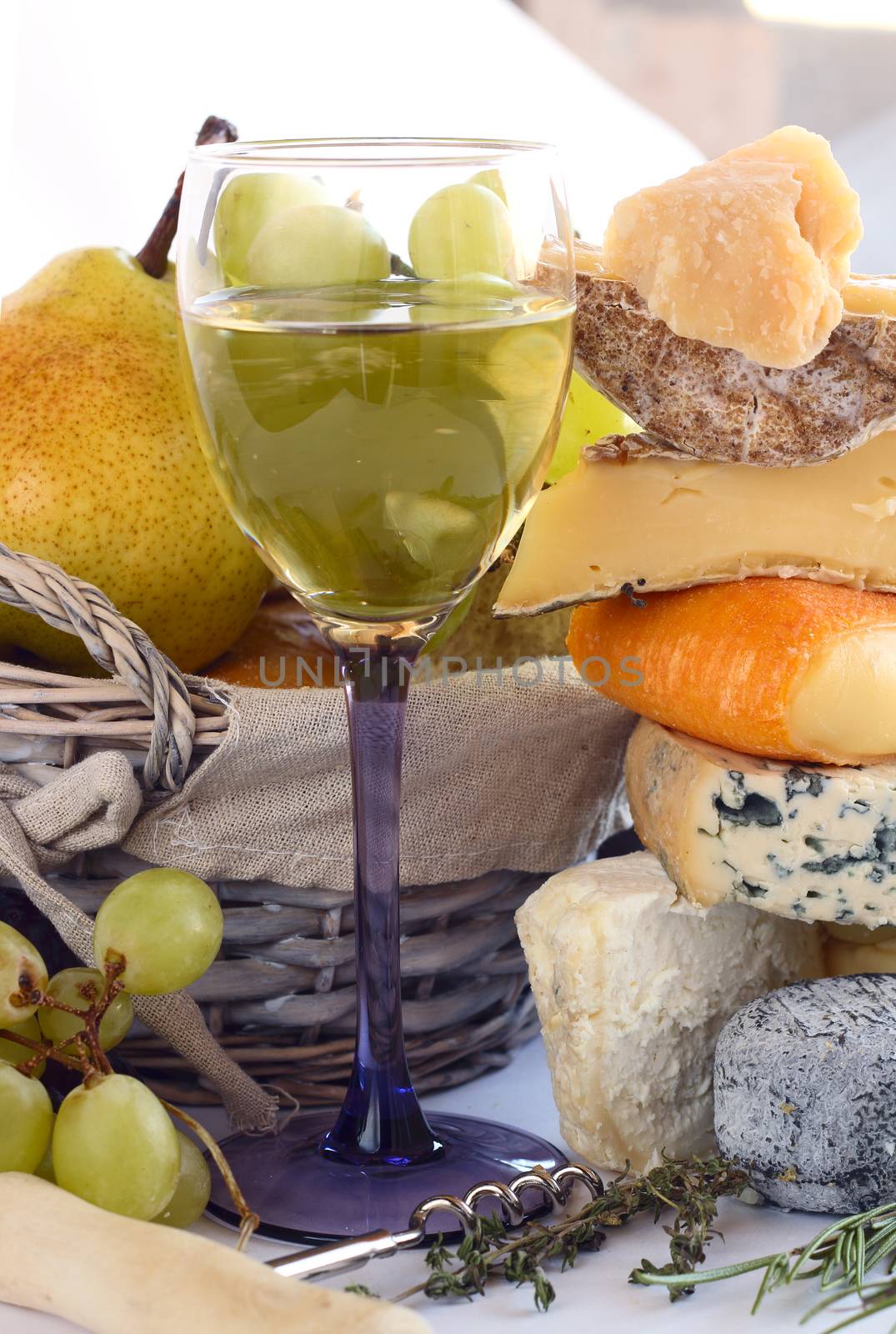 French Cheese, wine and fruits conceptual composition