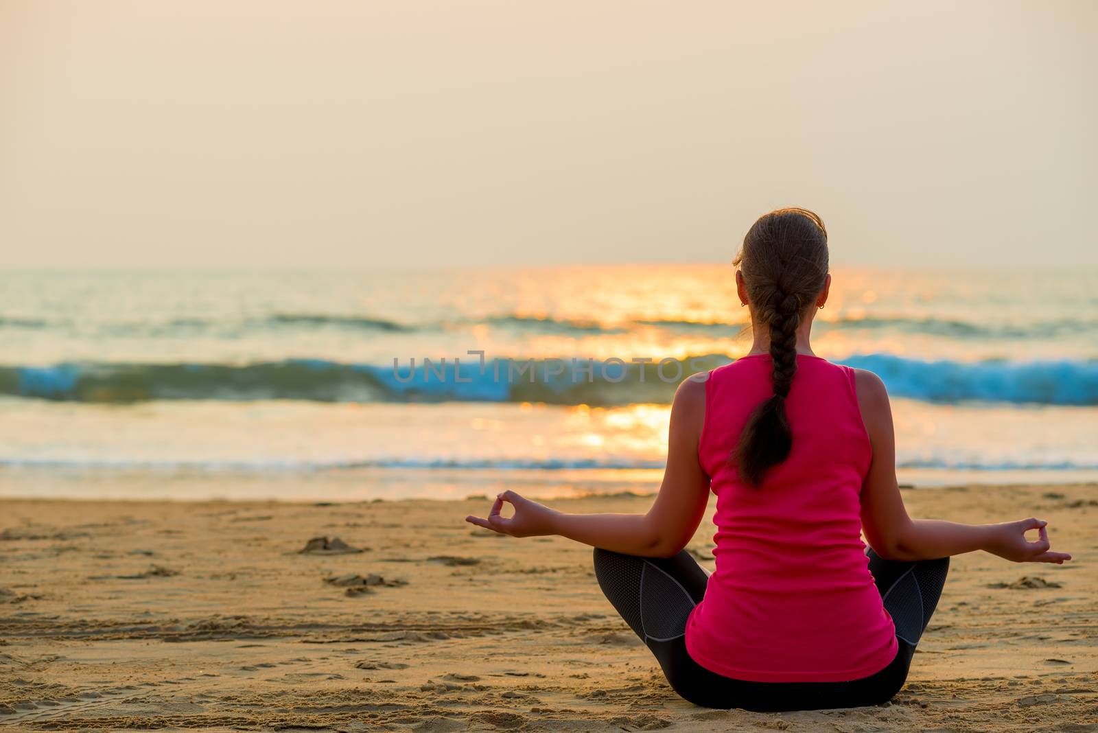 relaxation in the lotus position by the ocean