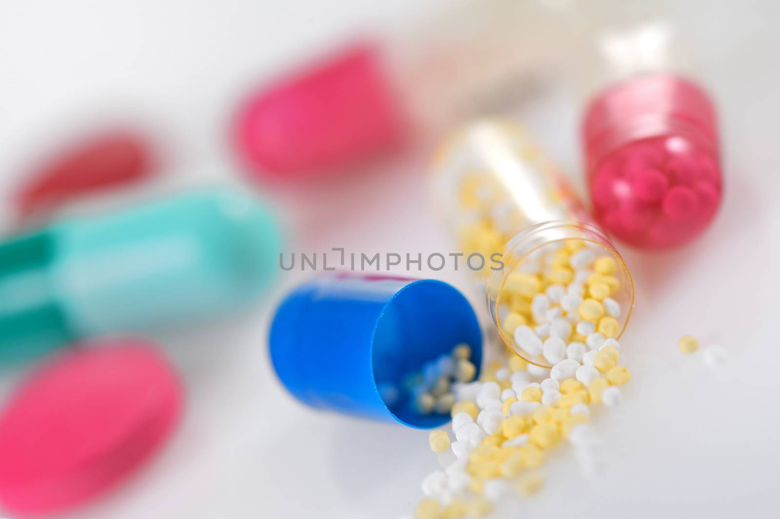 Medicine pills over white background