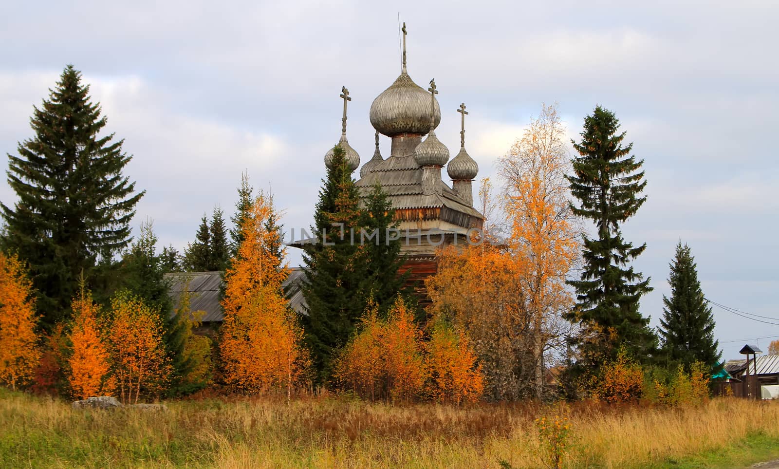 Ancient Russian Church in the autumn forest by max51288