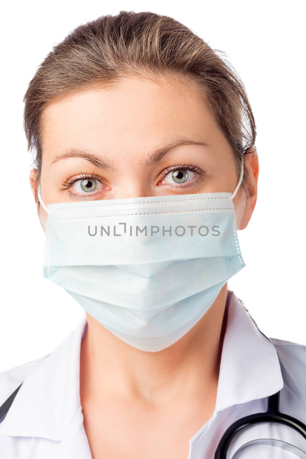 woman surgeon in medical mask on his face on a white background