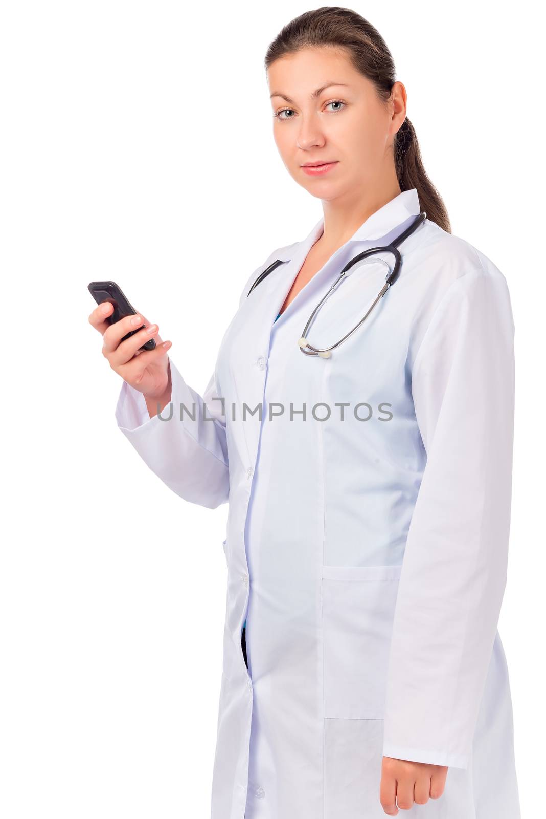 doctor in a medical lab coat with a phone in his hand