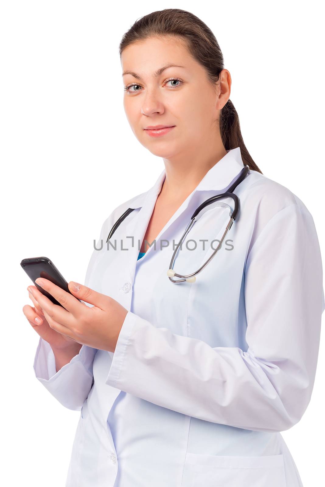 portrait of a woman in clothes of doctor with telephone
