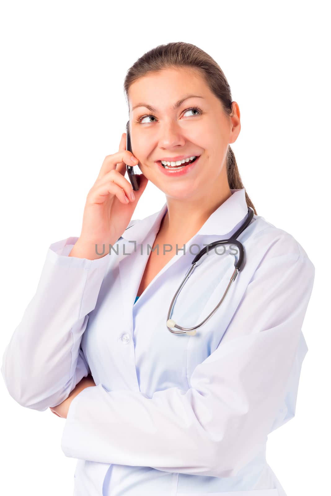 beautiful young doctor with a mobile phone isolated on white background