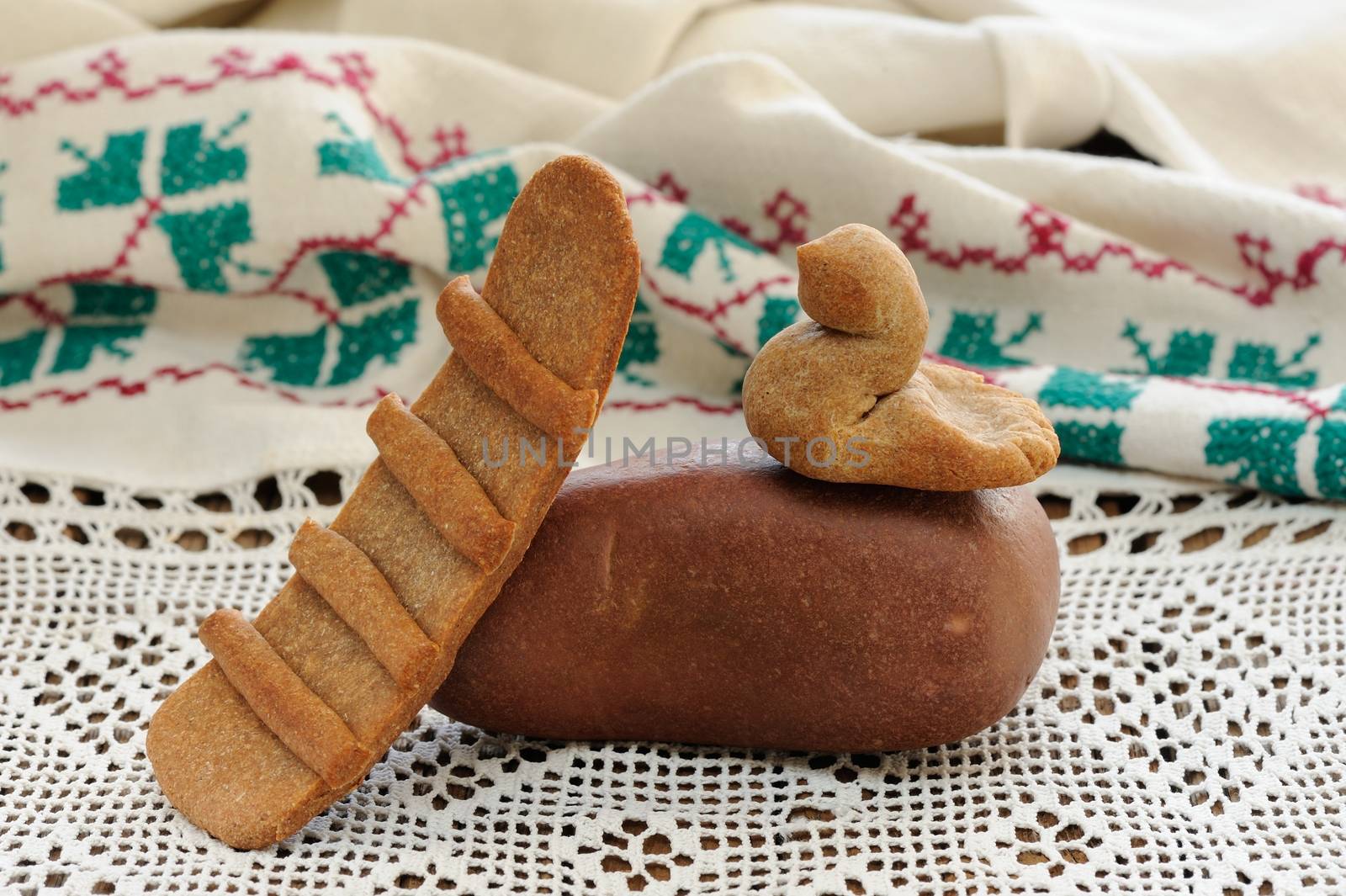 Lestvitsa and zhavoronok, Russian rye festive spring cookies on handmade rushnik horizontal