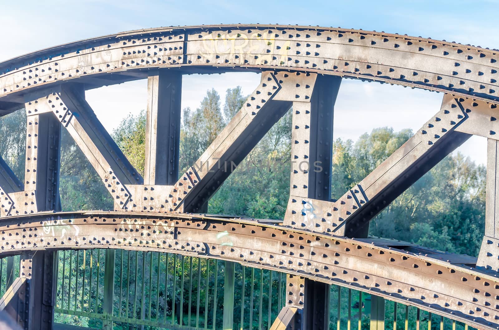 Riveted old bridge arch.