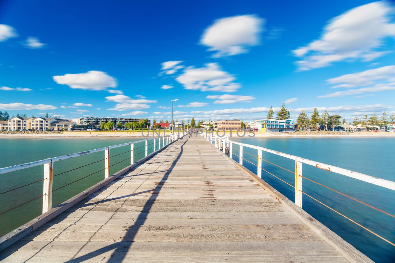 Long exposure shot of jetty in a beach by ymgerman