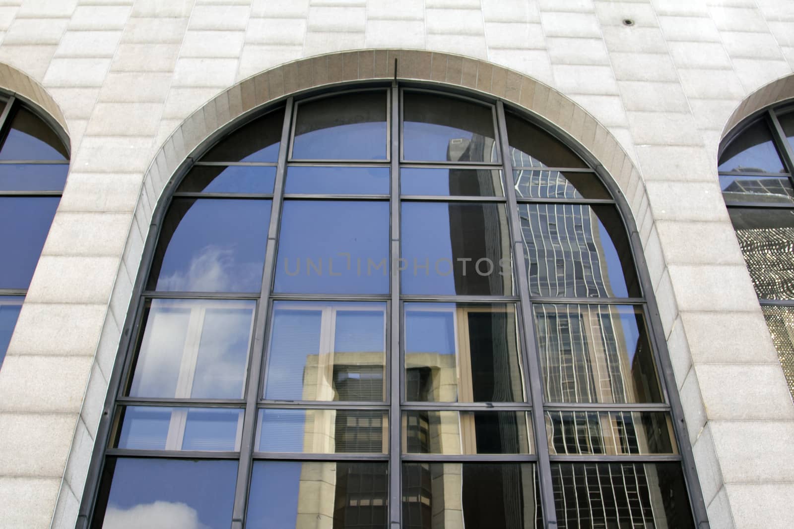 Modern building with glass facade in blue