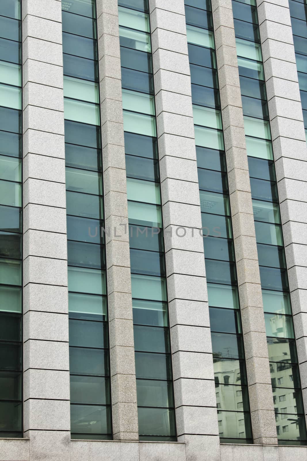 Modern building with glass facade in blue