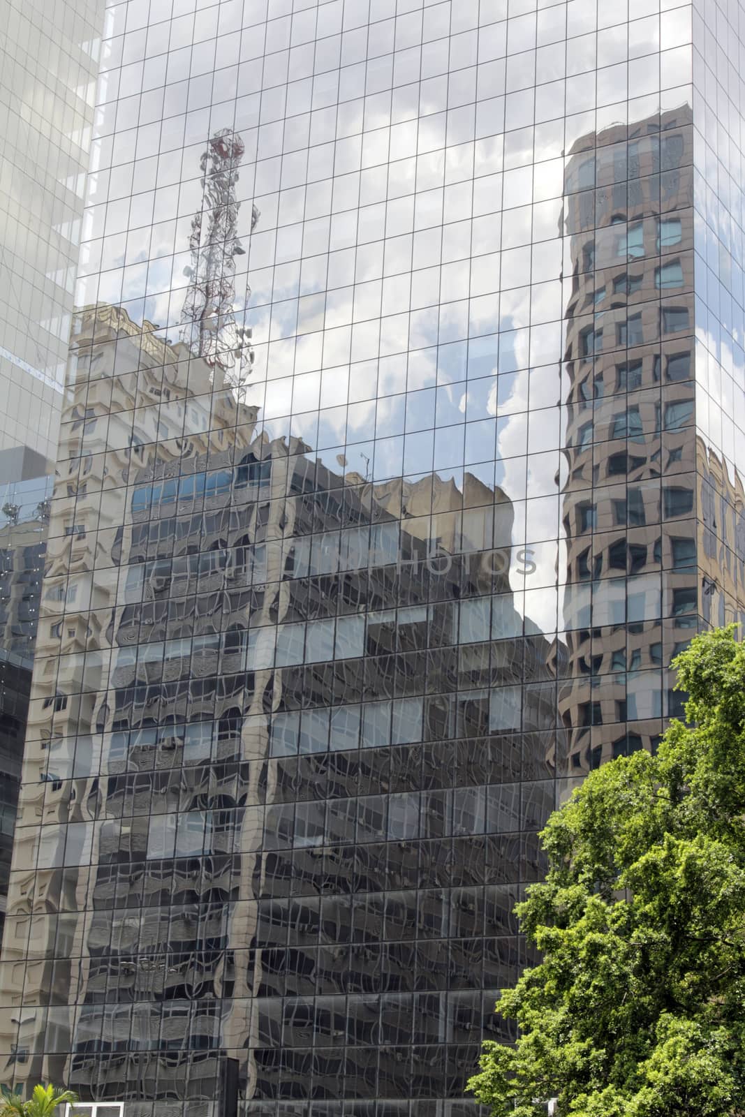 Modern building with glass facade in blue