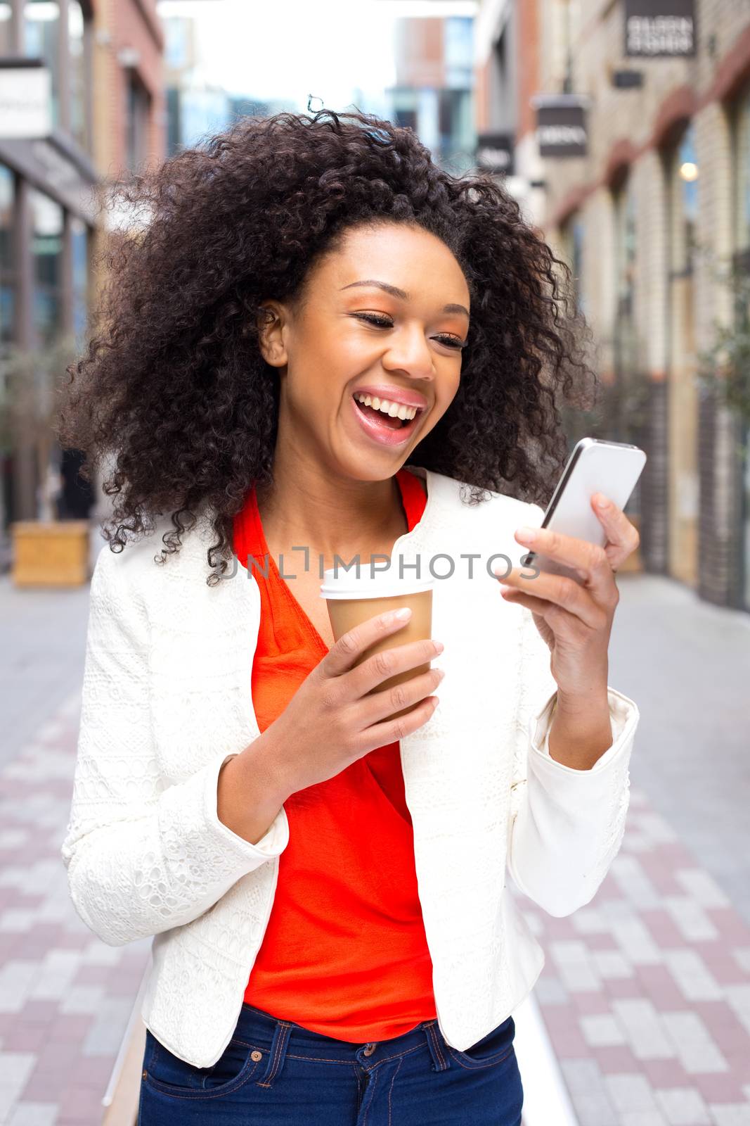 young woman reading her text messages.