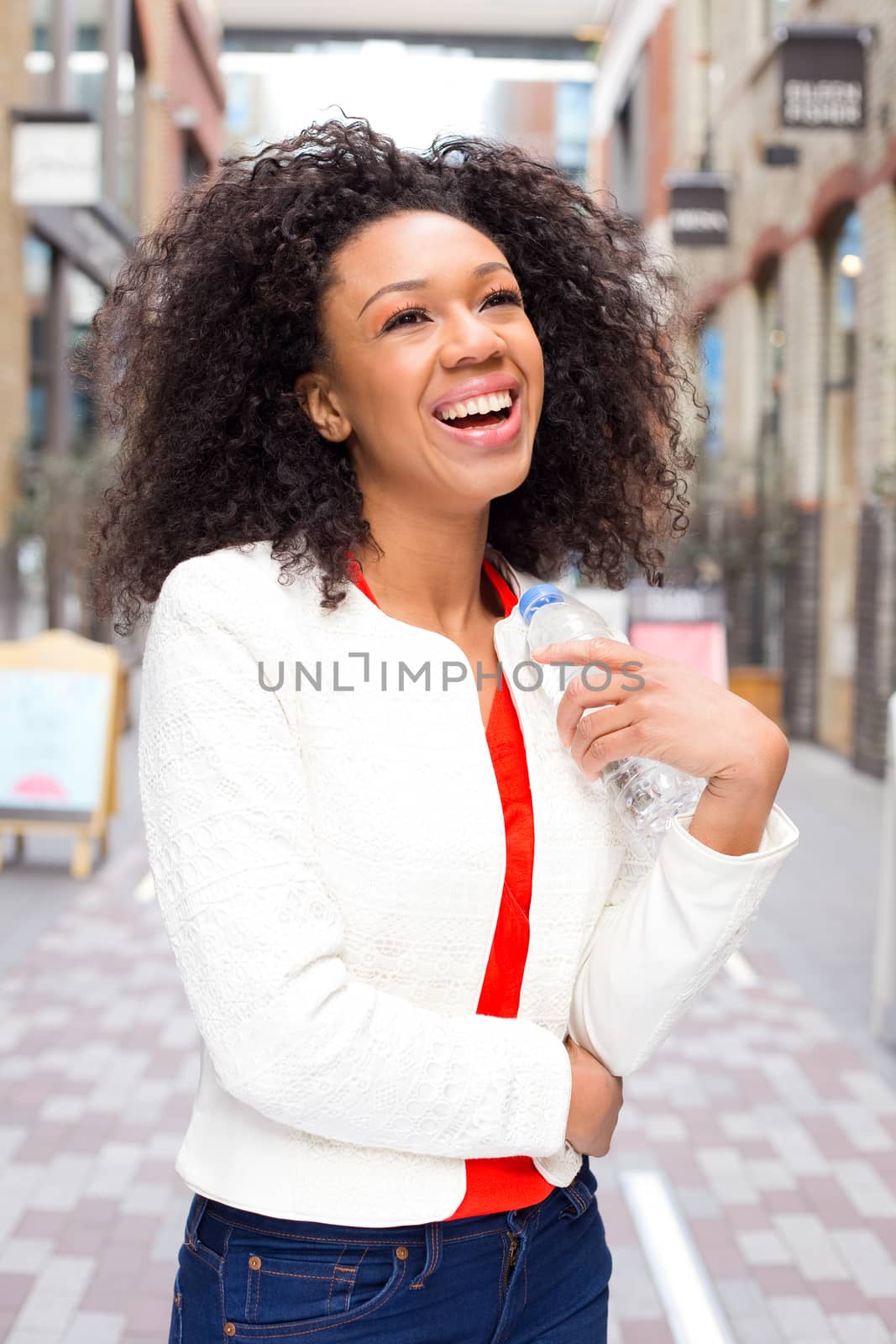 young woman holding a water bottle