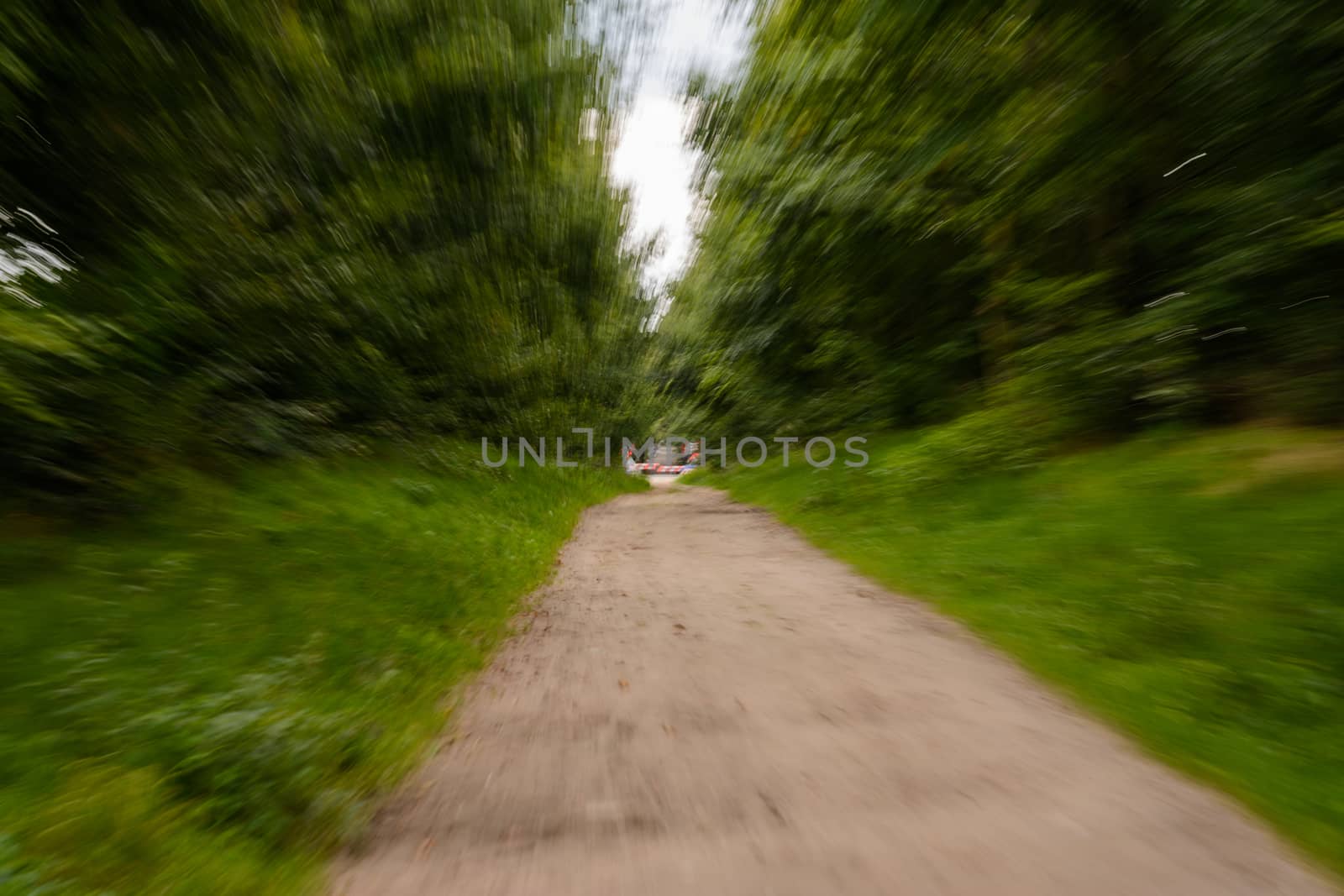 Zoom effect of path leading towards train crossing