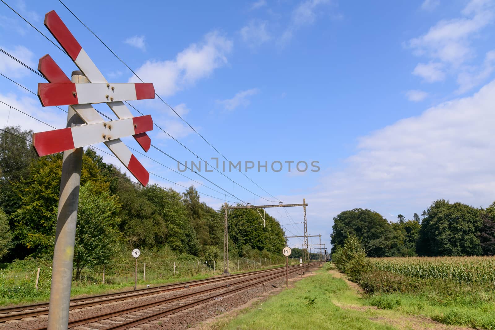 Sign by a railway crossing in holland
