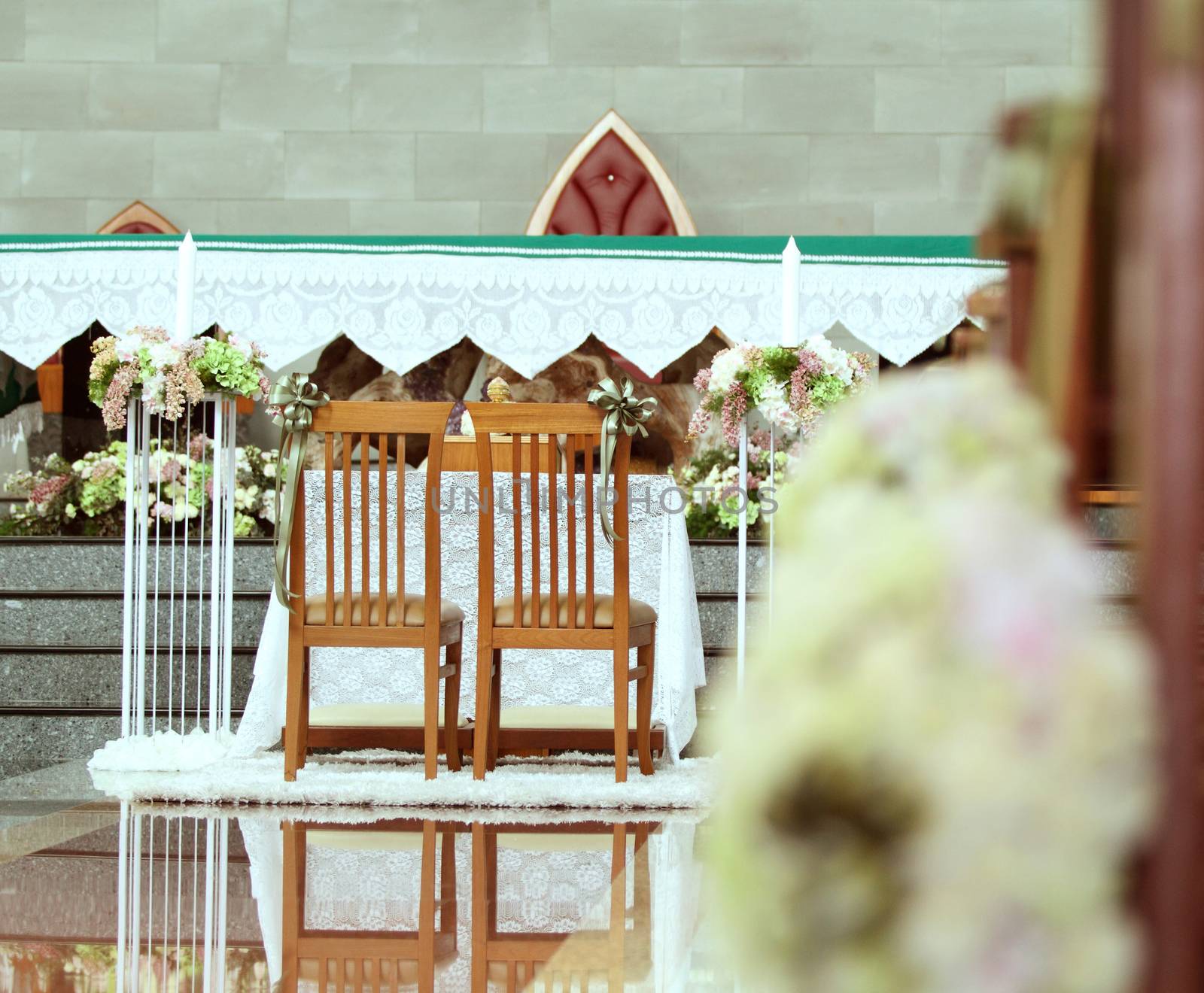 Table set for bride and groom in church