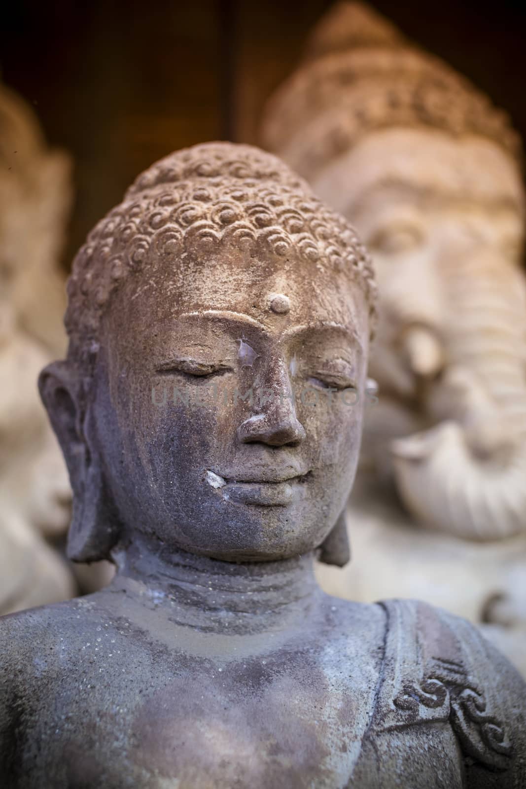 The old stone Buddha statue. Indonesia, Bali.
