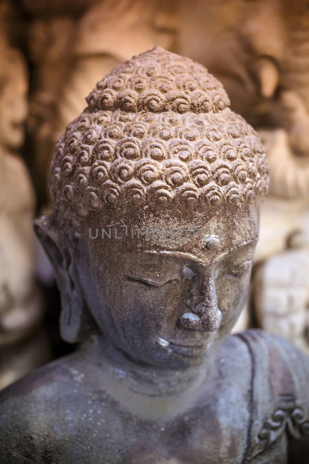 The old stone Buddha statue. Indonesia, Bali.
