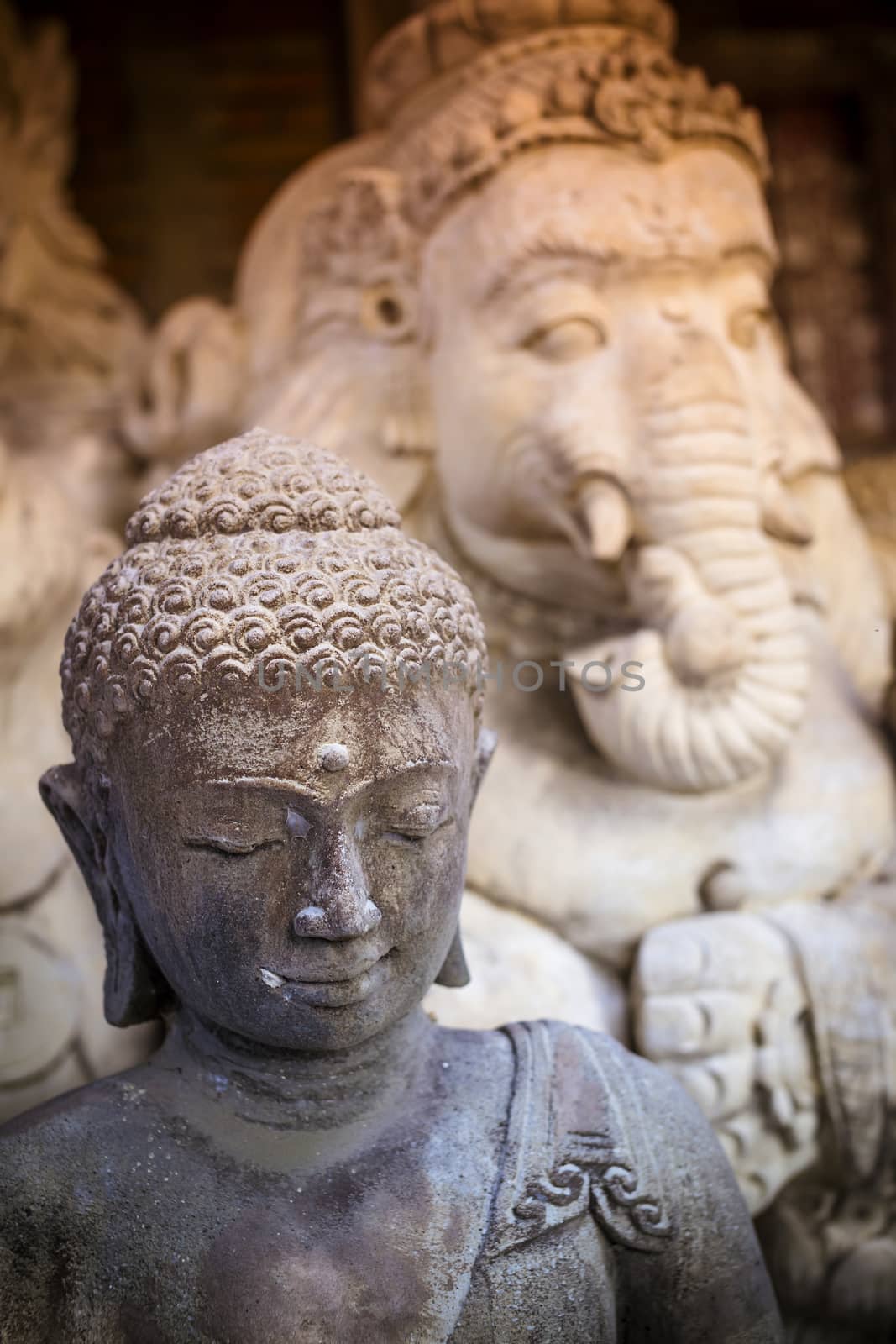 The old stone Buddha statue. Indonesia, Bali.
